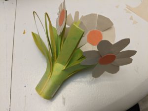 Photo of white paper flowers craft.