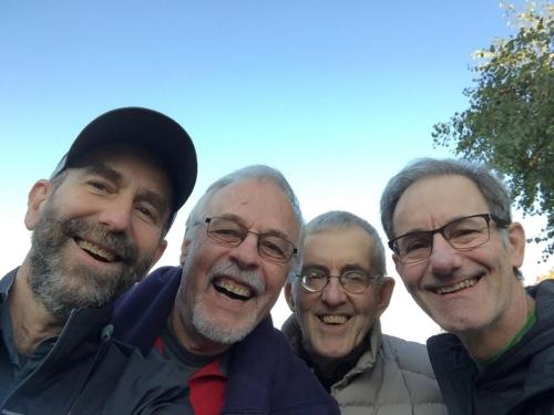 Four-men-in-a-happy-moment-during-a-mens-retreat